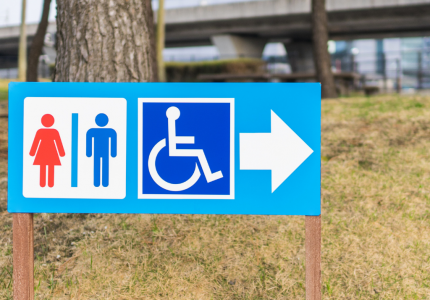 Disabled toilet sign - Photo by juice - Getty / Canva