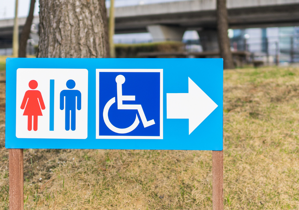 Disabled toilet sign - Photo by juice - Getty / Canva