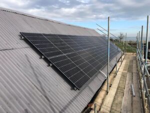 Solar Panel Installation on a Farm Building Roof